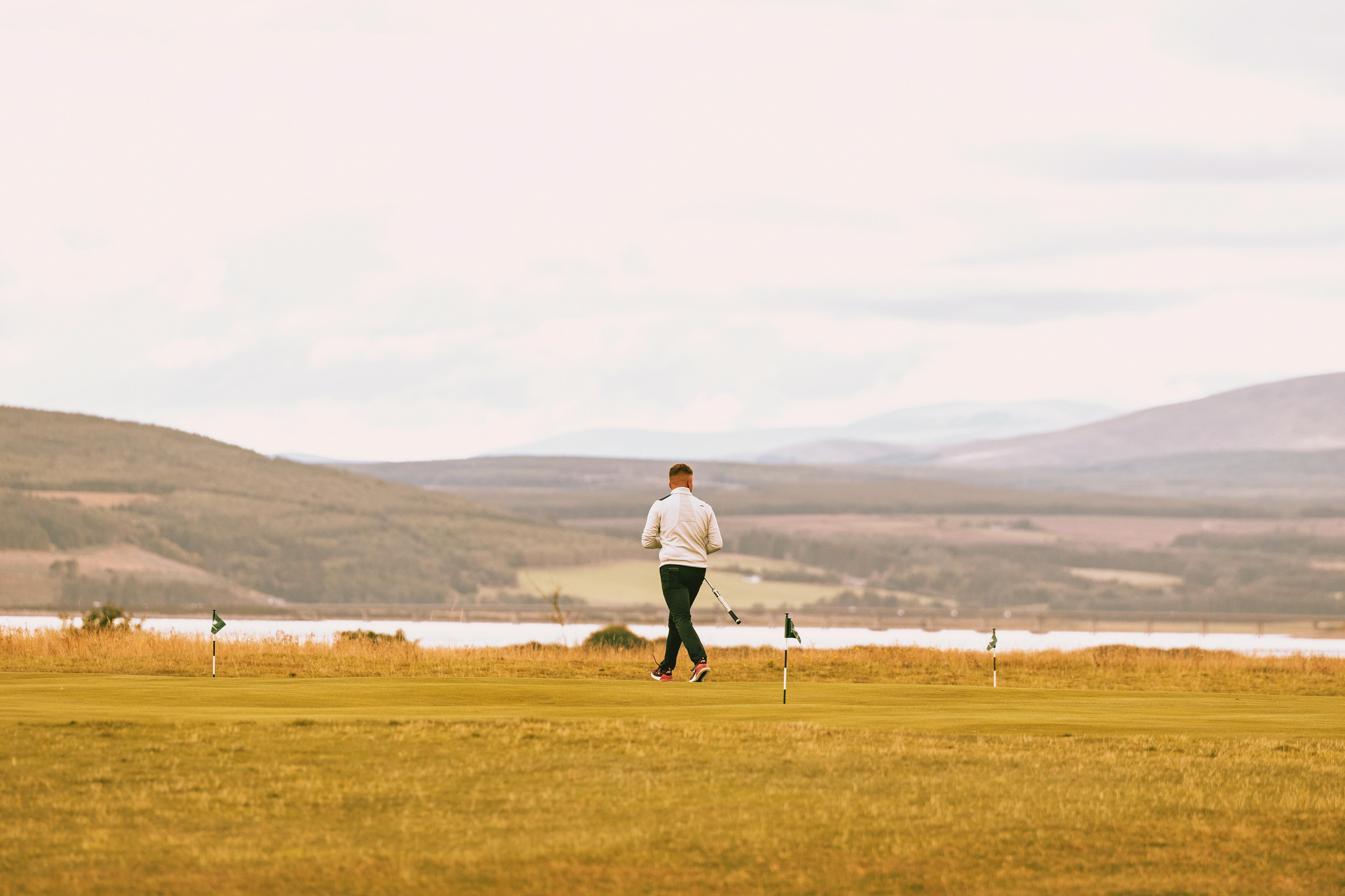 Dornoch Station Hotel Екстериор снимка A player on the 18th fairway